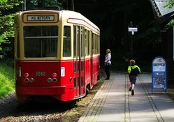 child running to a trolly