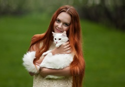 Redhead and her White cat