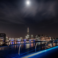 moon over the thames in london