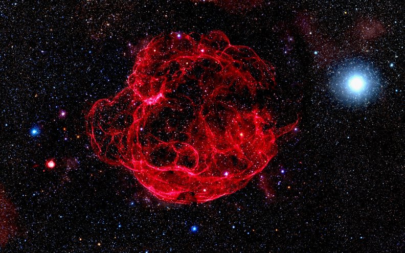 amazing_red_nebula_in_starry_galaxy.jpg