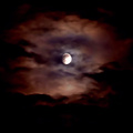 Spooky cloud covered moon
