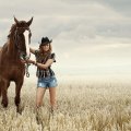 Cowgirl In A Field