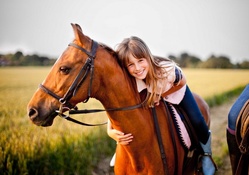 ENJOYING HER HORSE