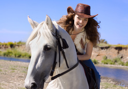 COWGIRL RIDING A HORSE  GIDDY UP