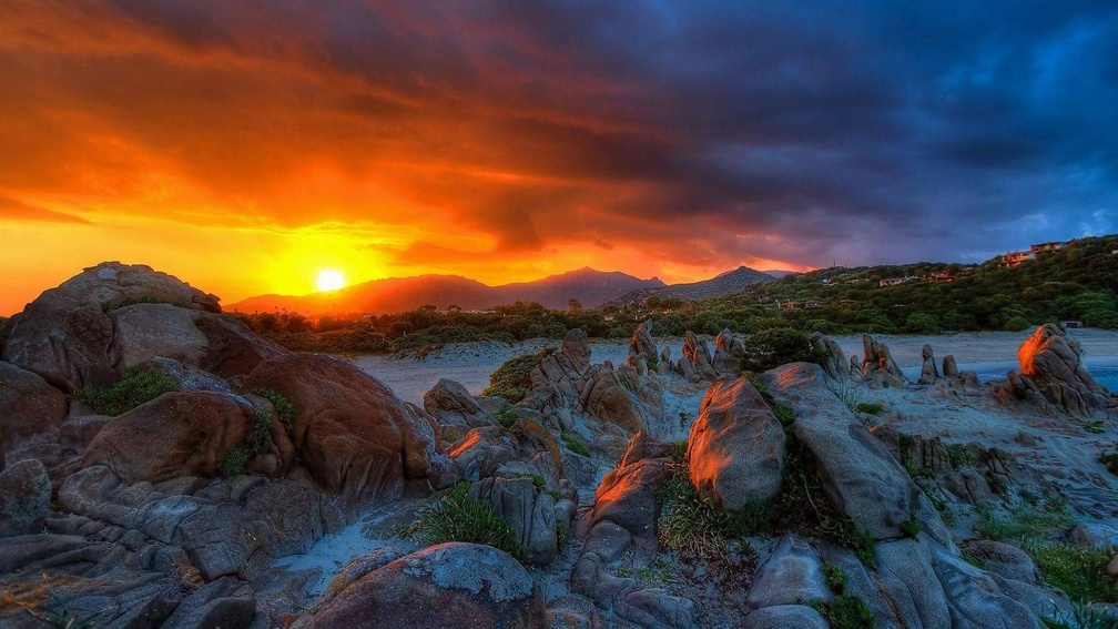 superb sunset over rocky shore hdr
