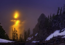 reflection of a sunset on crater lake