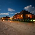 Tropical Beach Bungalows at Night