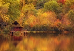 House on Lake in Autumn