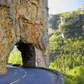 winding road through a rock portal in france