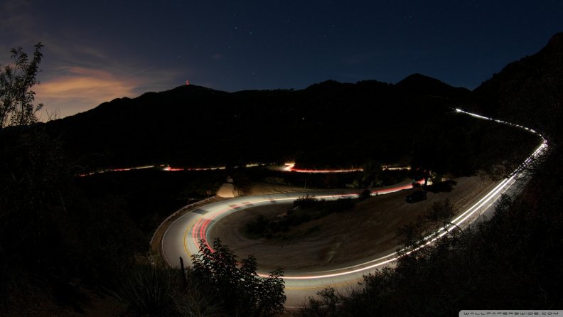 car_lights_on_a_mountain_road.jpg