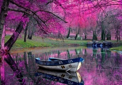 A boat on a purple lake