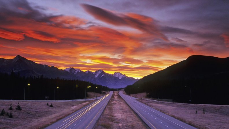 the_interstate_through_the_mountains_at_sunset.jpg