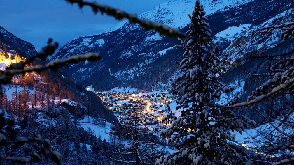 swiss village in an alpine valley