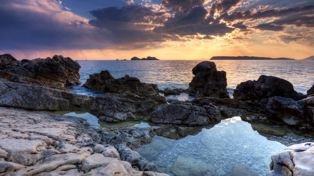pools among rocks on a croatian seashore hdr