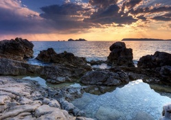 pools among rocks on a croatian seashore hdr