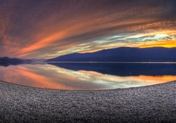 amazing stony lakeshore at sunrise