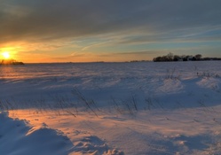 sunset over winter landscape