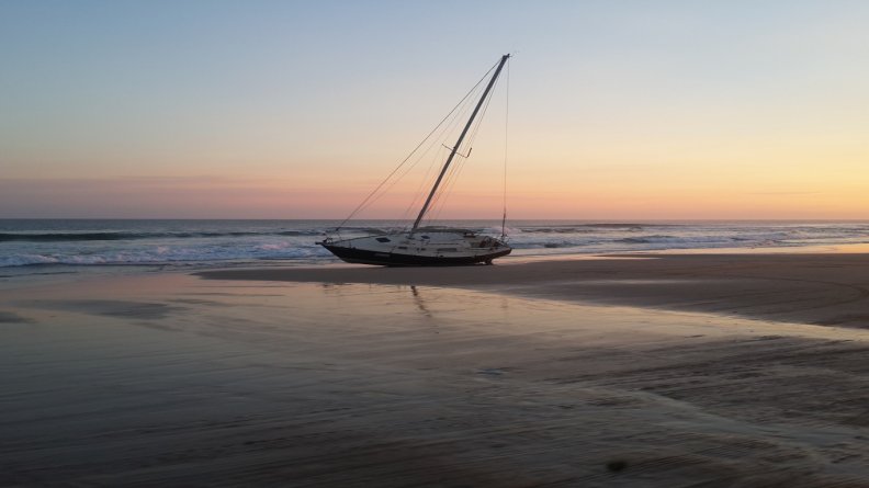 lonely_sailboat_on_a_uruguay_beach.jpg