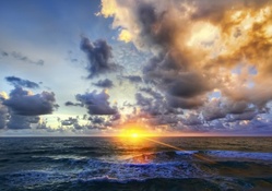 sunrise over ocean waves