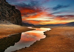 river at sunset in an arid prairie hdr