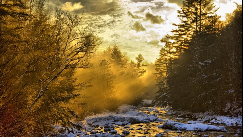 heavenly morning sun rays on a river in winter hdr