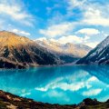 beautiful deep blue mountain lake