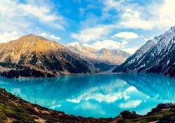 beautiful deep blue mountain lake