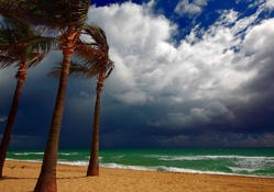 storm coming on to a tropical beach