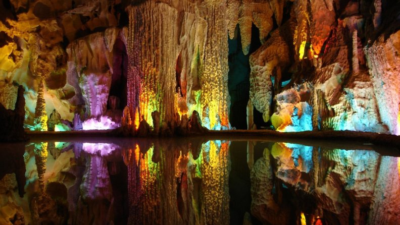colored_lights_reflected_inside_a_beautiful_cave.jpg