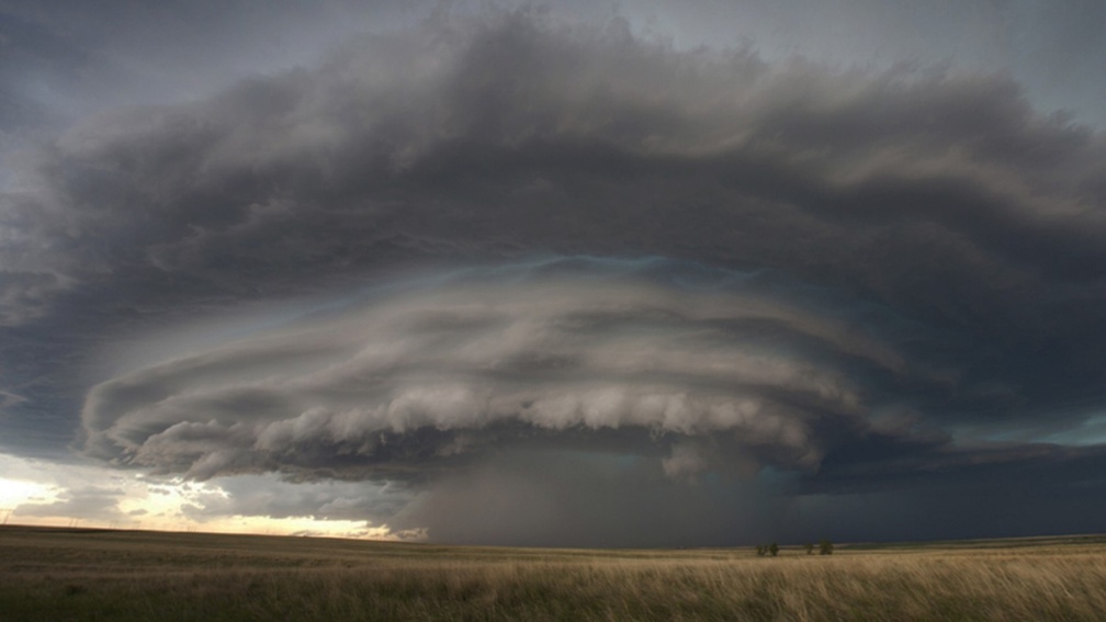 supercell clouds over fields