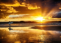 Sunset on the Surfers at Byron Bay, Australia