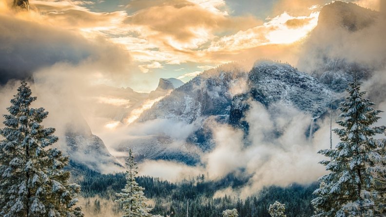 magnificent_mountains_in_morning_fog_hdr.jpg