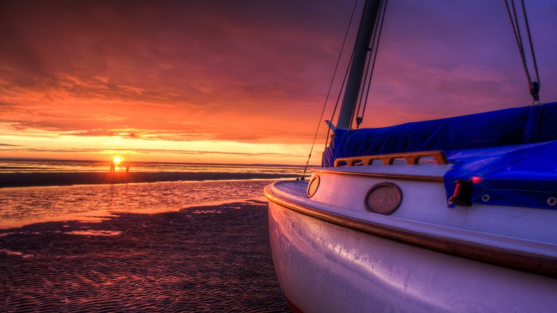 gorgeous_sunset_on_a_beached_sailboat_hdr.jpg