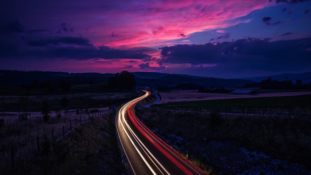 light on highway in long exposure at twilight