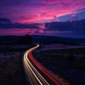 light on highway in long exposure at twilight
