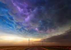 spectacular lightning storm over a texas road hdr