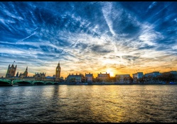 sunset over the thames river in london hdr