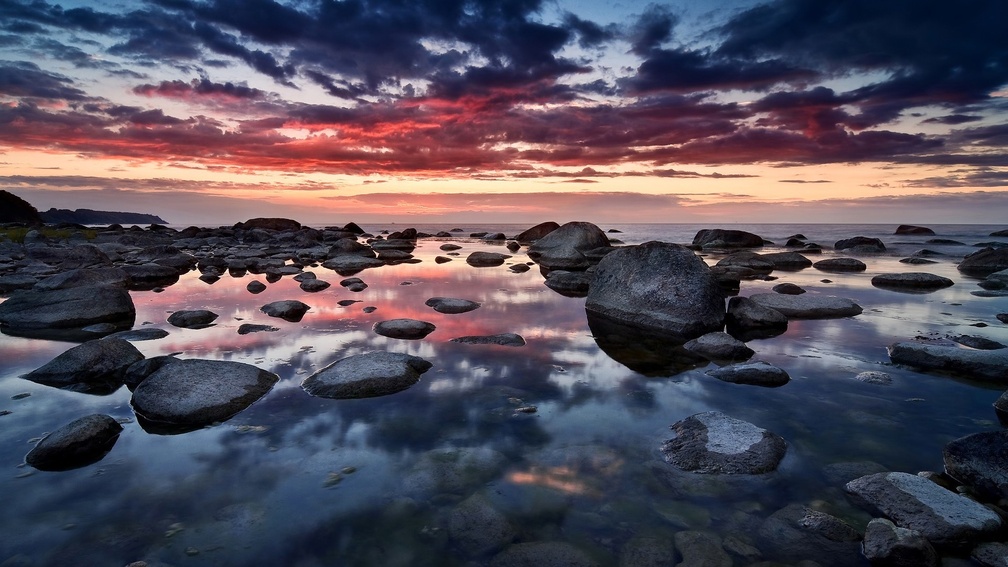 wonderful rocky seashore at sunset