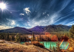sun rays over amazing natural landscape hdr