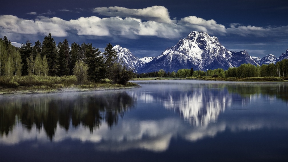 mount moran above snake river in the grand tetons