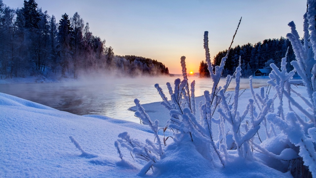 steam rising from a river in winter
