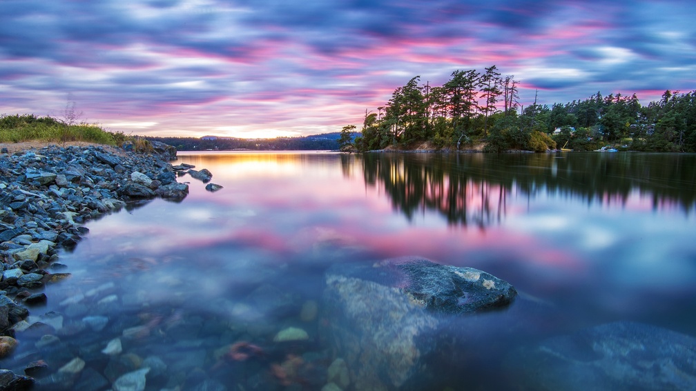 colorful sky reflected in a lake hdr