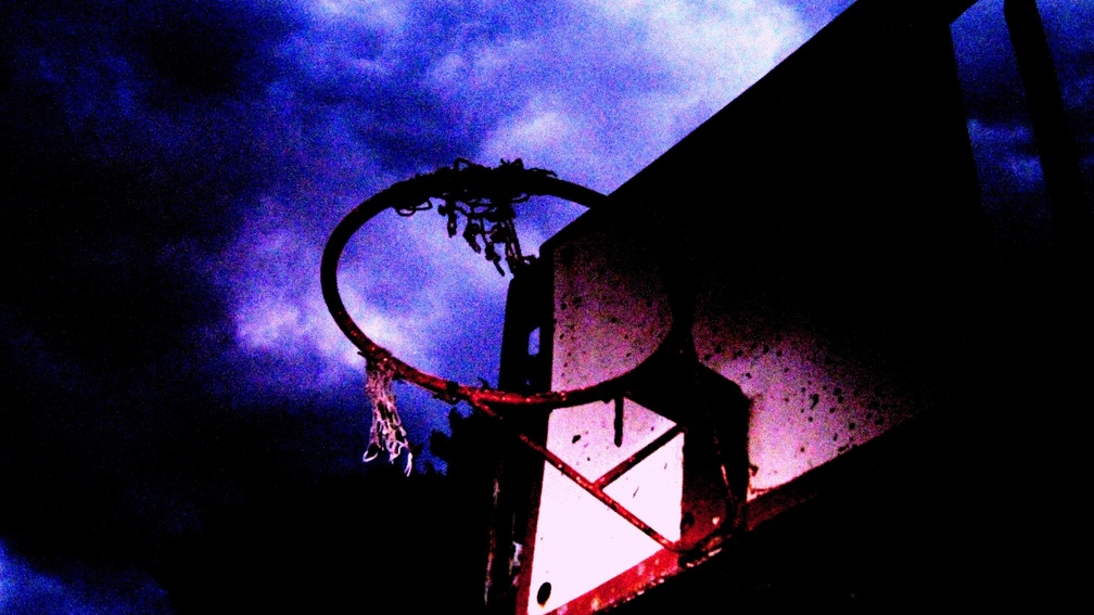 Basketball Hoop with Tattered Net