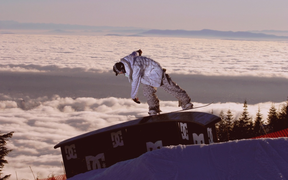 Snowboarding above the clouds