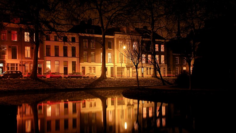 misty evening on a canal in utrecht holland