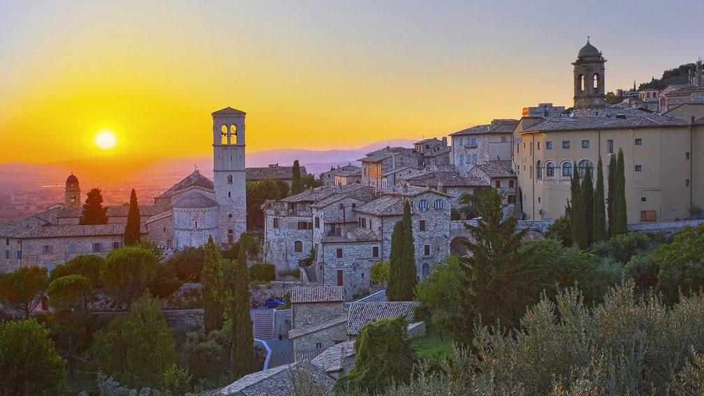 wonderful hillside town of assisi italy at sunset
