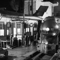 retro steam train at a station