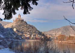 castle above cochem germany in winter