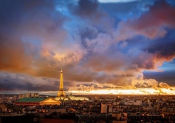 fantastic view of paris on a cloudy sunset