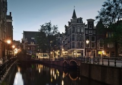evening on an amsterdam street canal